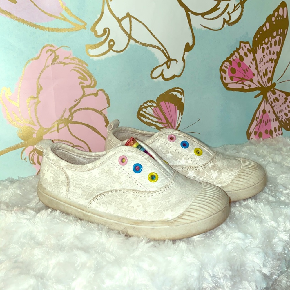 White sneakers that turn white with pink stars